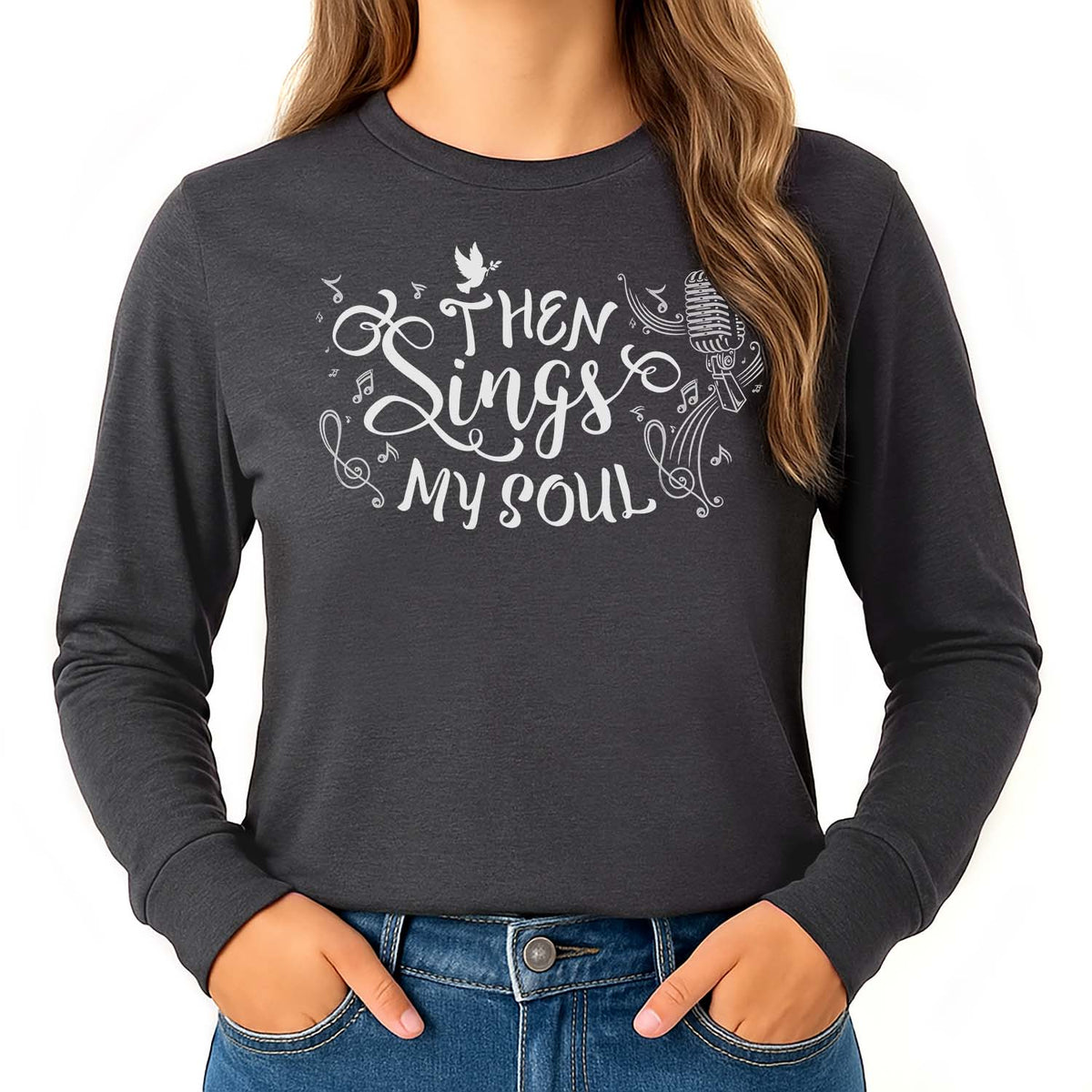 Dark grey shirt with 'Then Sings My Soul' text and musical notes worn by a young blonde woman