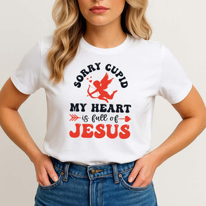 Young model wearing a white sorry Cupid t-shirt for Valentine's Day