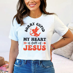 Young model wearing a white sorry Cupid t-shirt for Valentine's Day