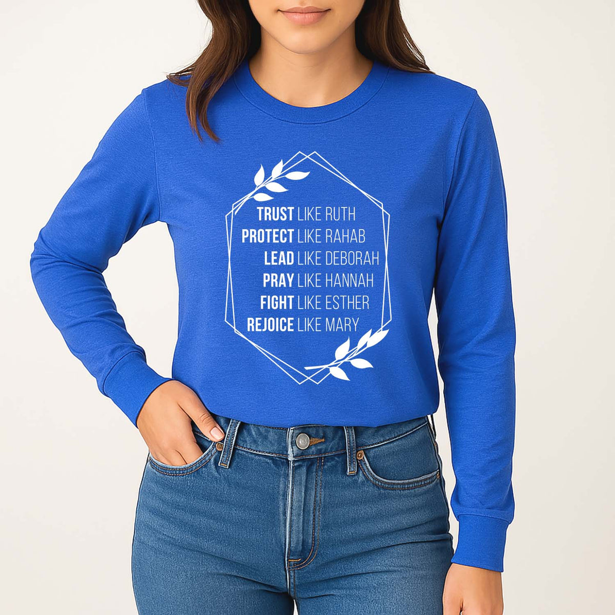 Young woman wearing a blue long-sleeve shirt with Biblical references screenprinted in white