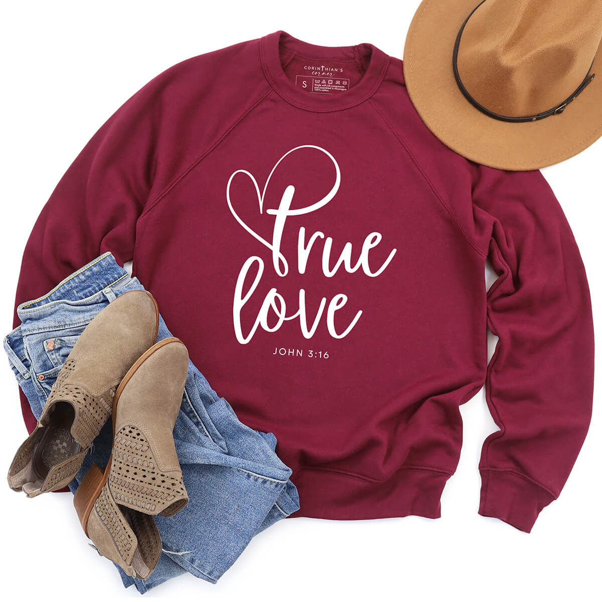 Cozy fleece sweatshirt that reads true love John 3:16