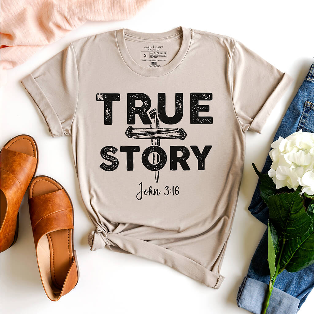 Graphic Christian t-shirt that reads true story with a 3 nail cross in honor of Easter Sunday