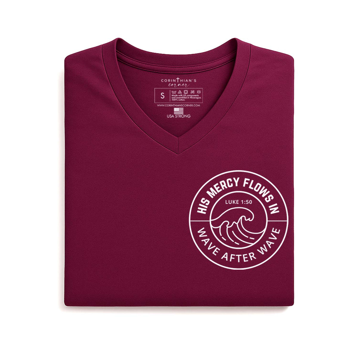 Folded maroon v-neck with white graphic and Luke 1:50 inscription