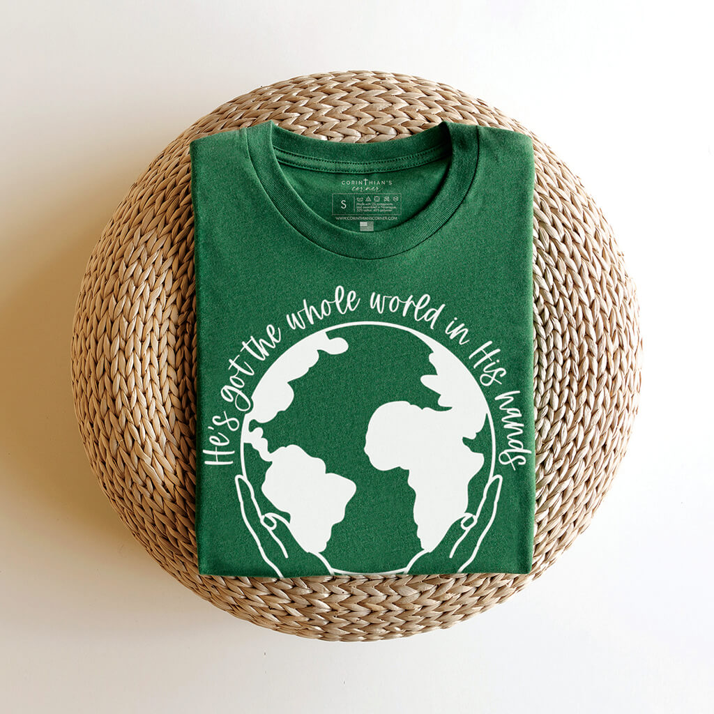 He's got the whole world in His hands graphic t-shirt design in green