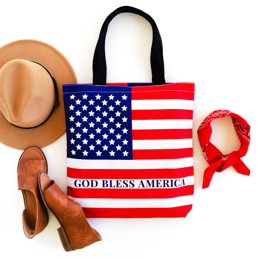 American flag tote bag that reads God bless America