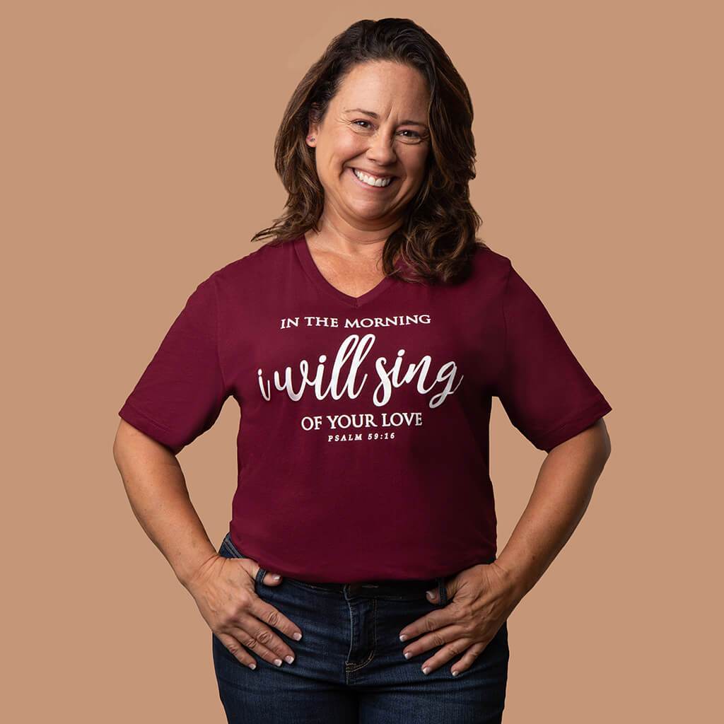 Maroon v-neck shirt for Christian women that says I will sing of your love