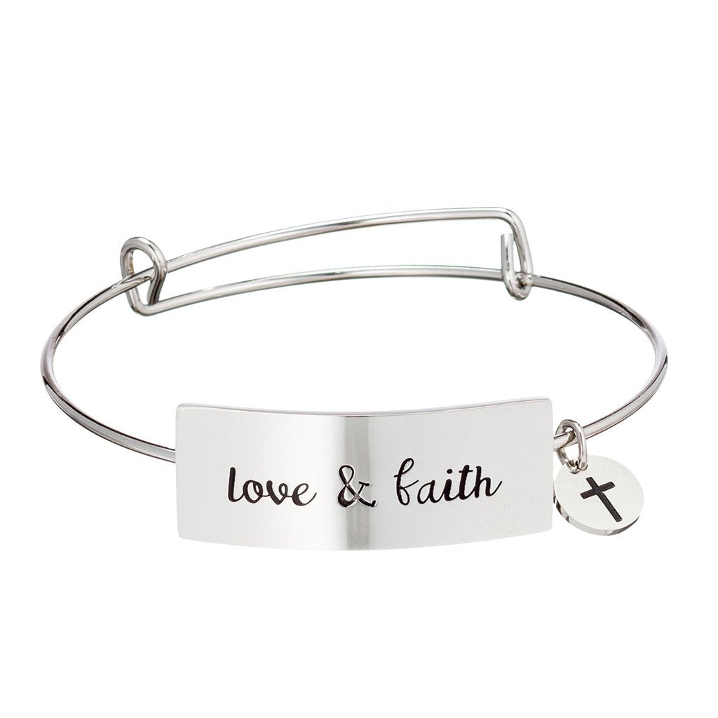 Stainless steel bracelet with horizontal plate that reads "love & faith"