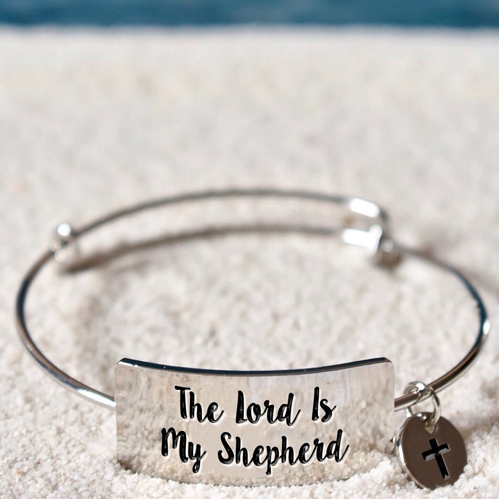 Biblical bracelet with a cross charm and "the Lord is my Shepherd" engraving